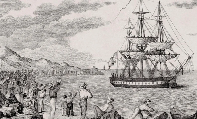 An old-timey block print illustration of people on a shore waving to a large boat with sails